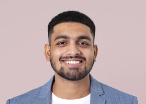 smiling businessman face portrait wearing suit scaled